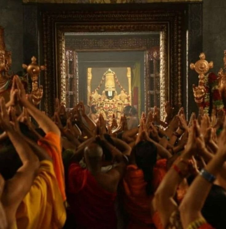 Devotees in prayer at the temple